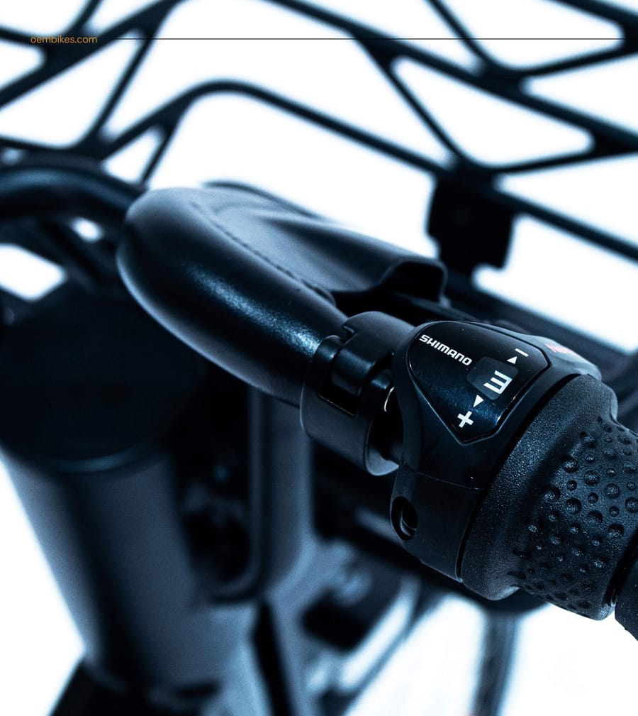 OEMbikes close up macro photography of Shimano gear shifter on e-bike handlebar, product photography for On Poynt Creative